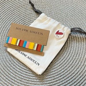 Roxanne Assoulin Enamel coated stretch bracelet with a gold tone logo